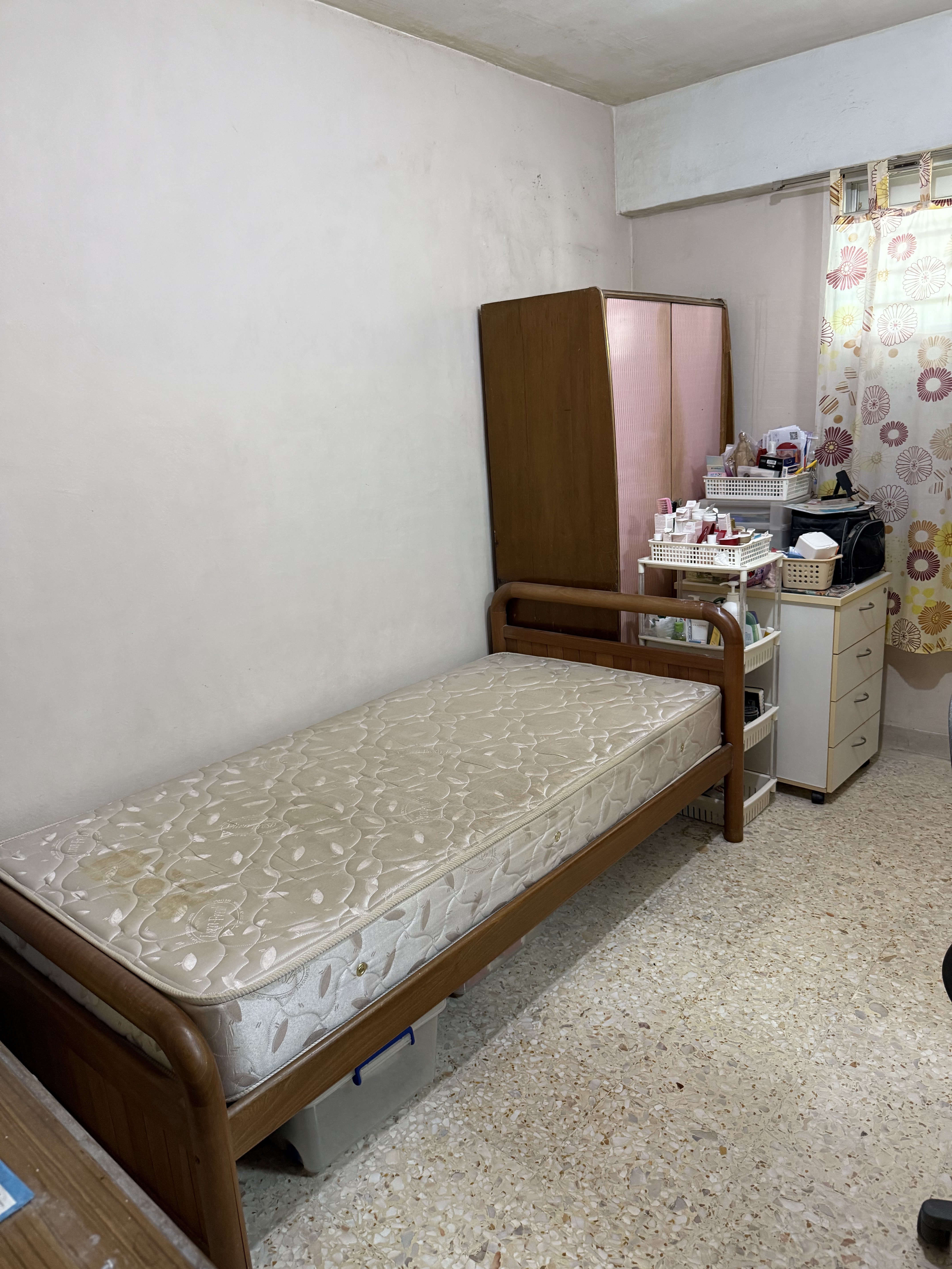Single bed mattress and wooden bed frame cleared from a Ang Mo Kio residence.