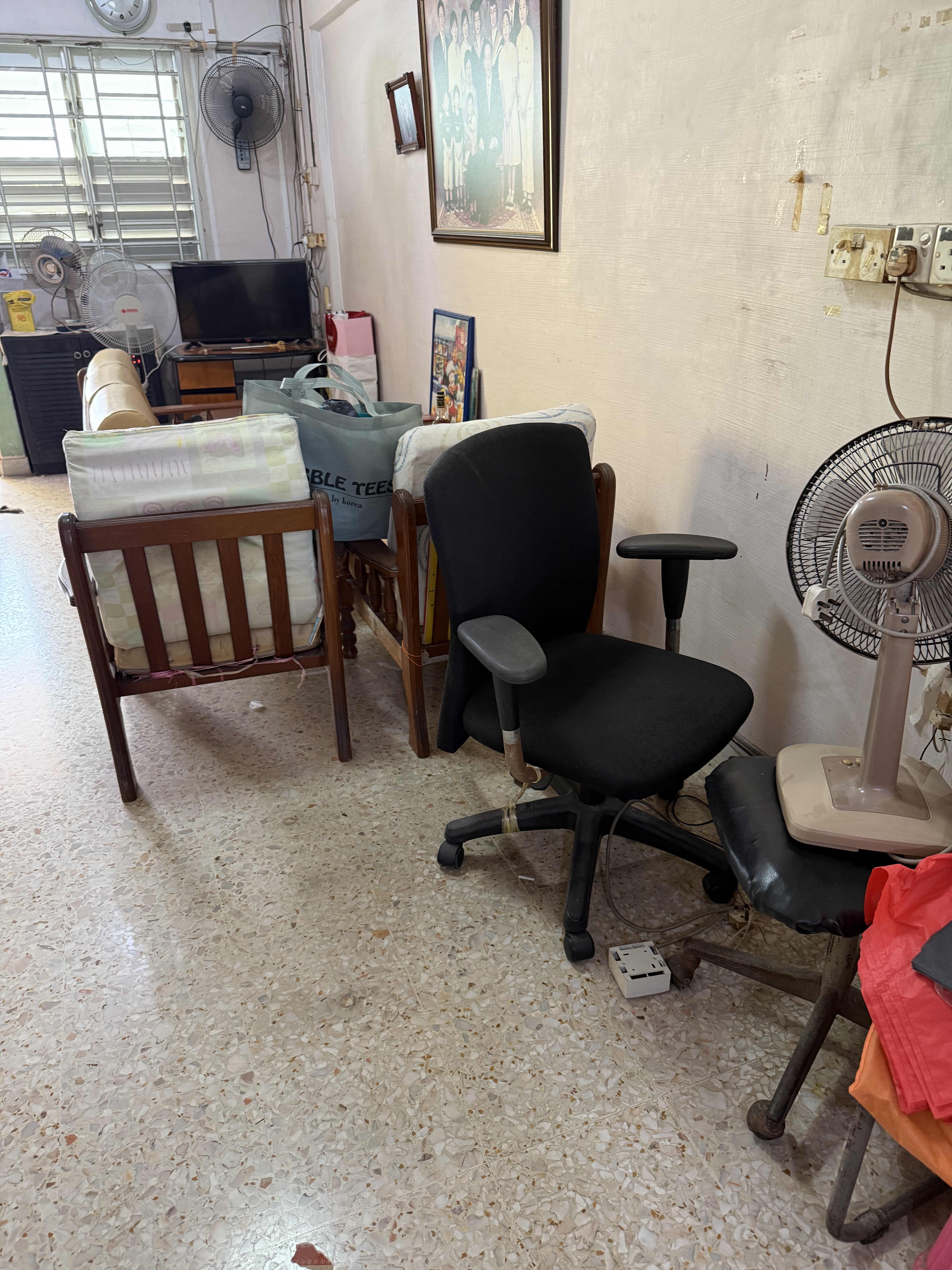 Disposal of assorted household items and furniture from an Ang Mo Kio residential unit.