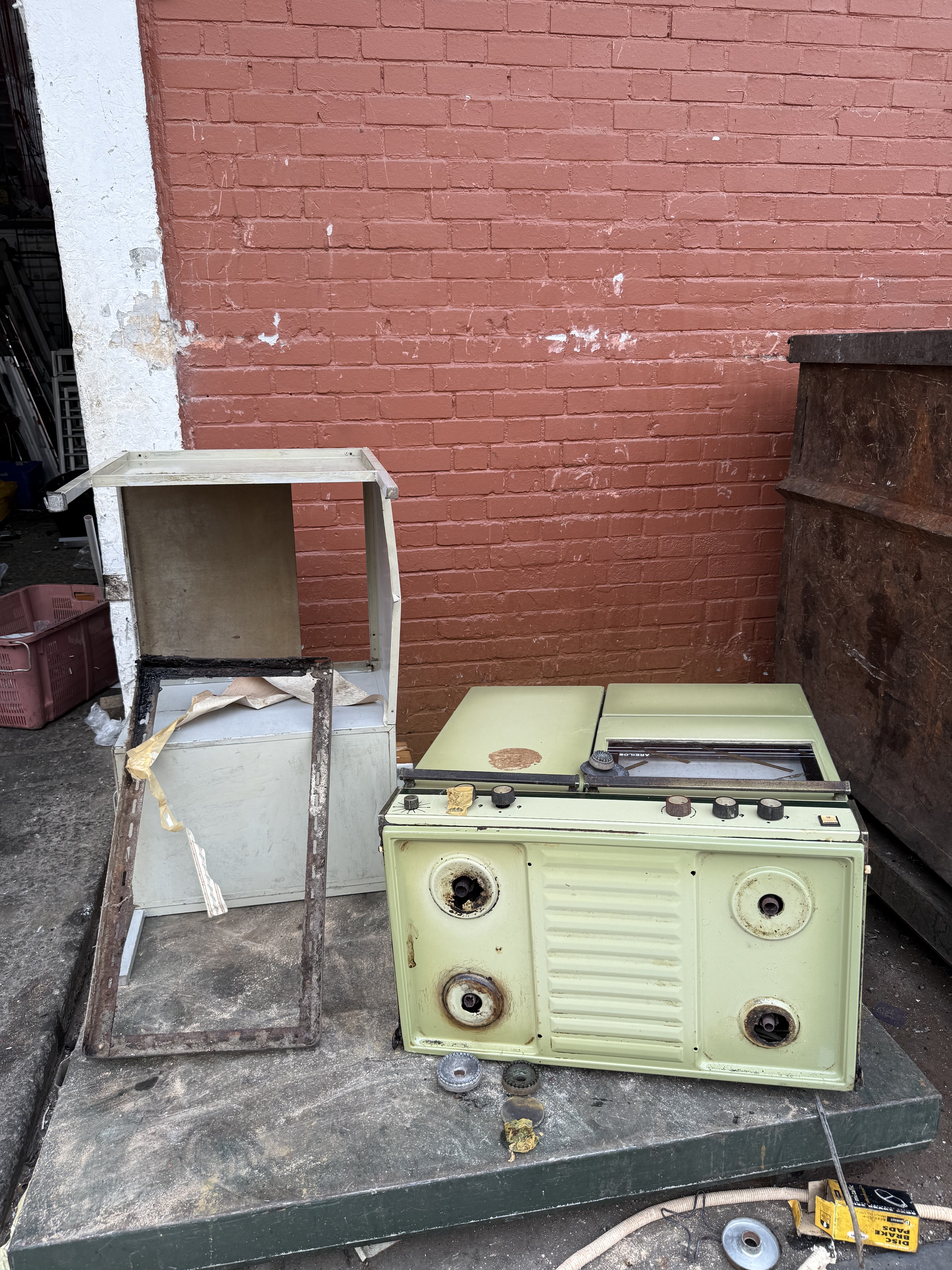 Old stove and appliance parts cleared from a property in Woodlands.