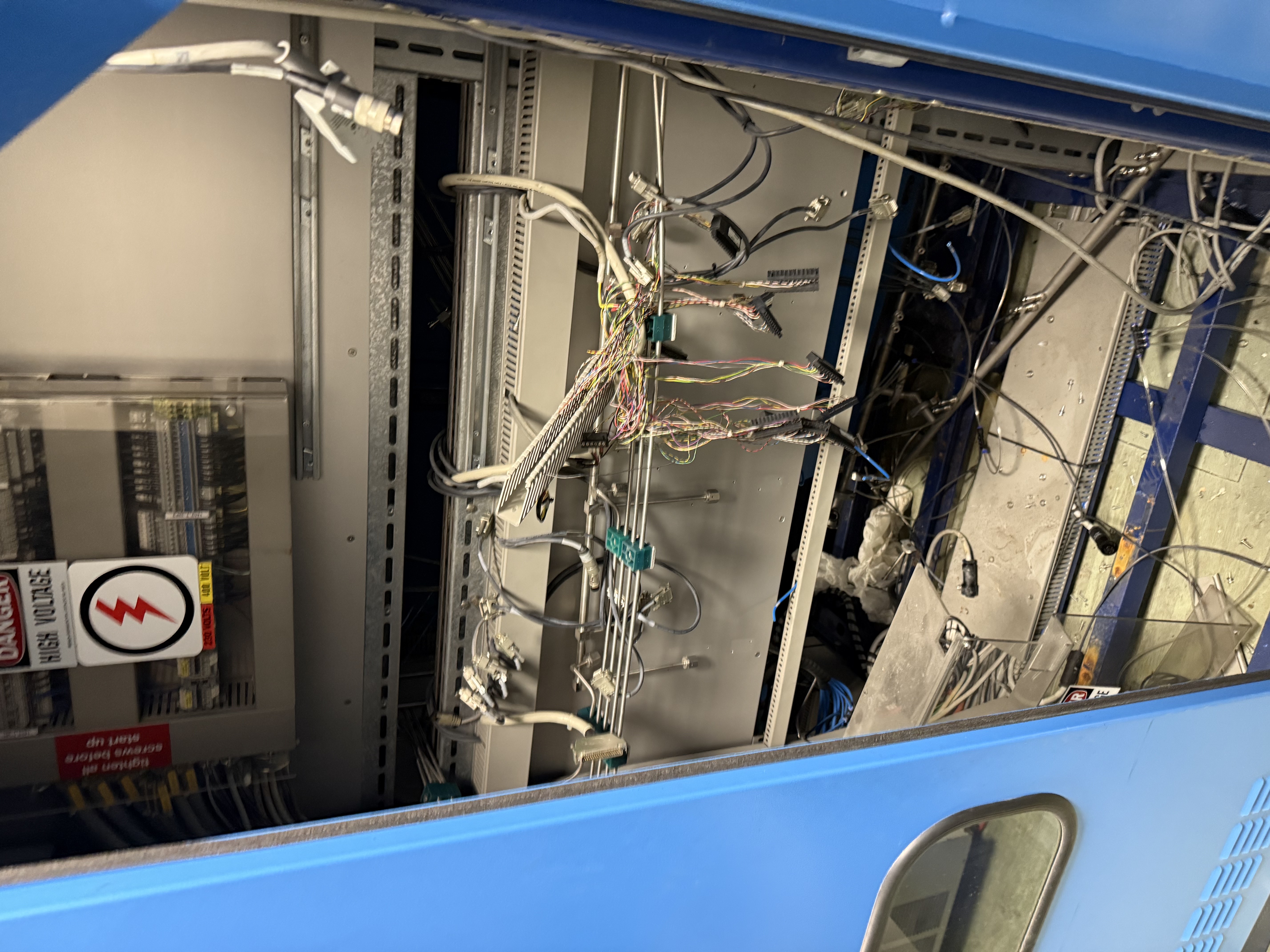 Before: optical tables and lab fixtures awaiting removal.