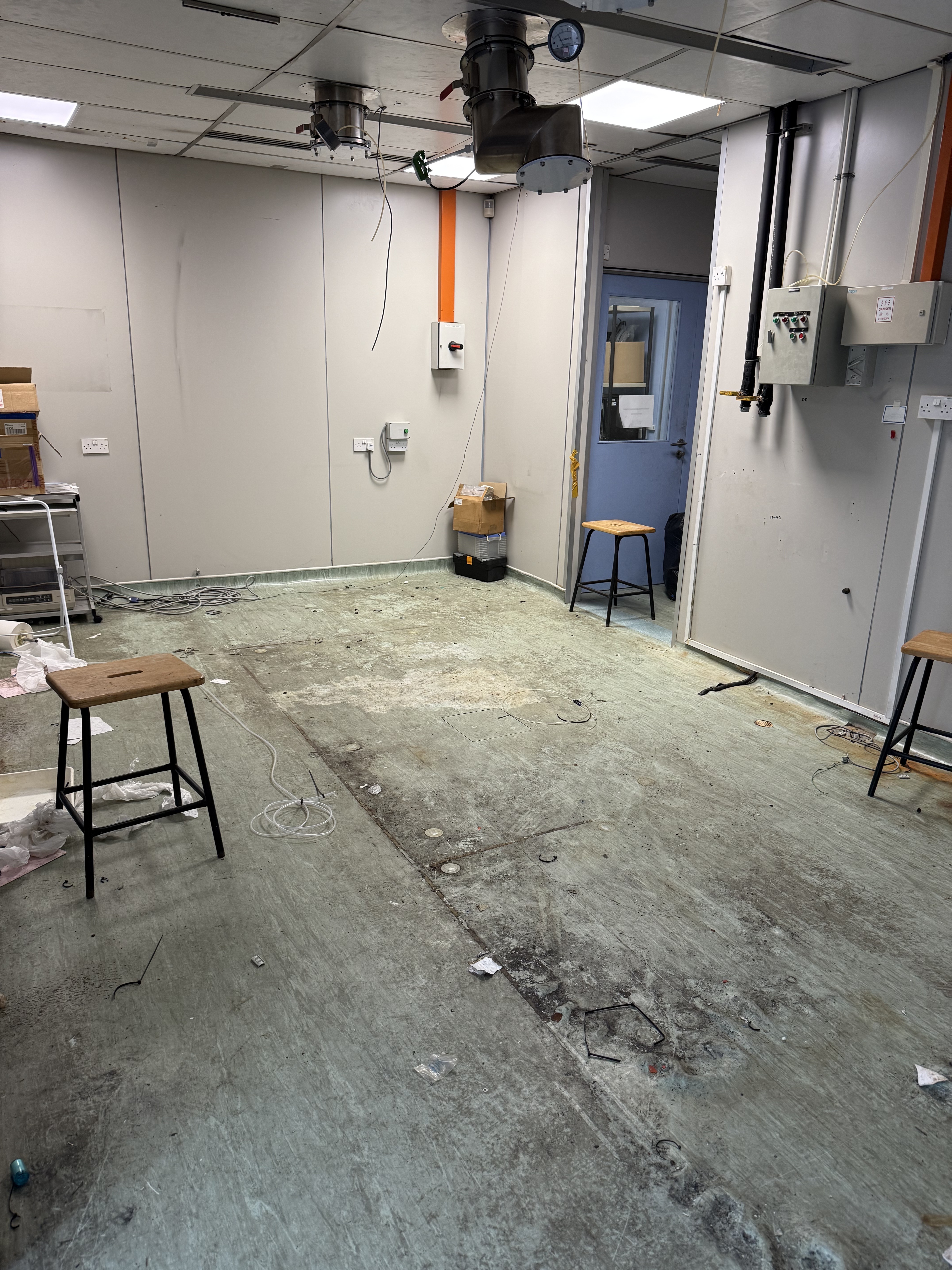 After: cleared lab floor following the NTU Photonics equipment removal.