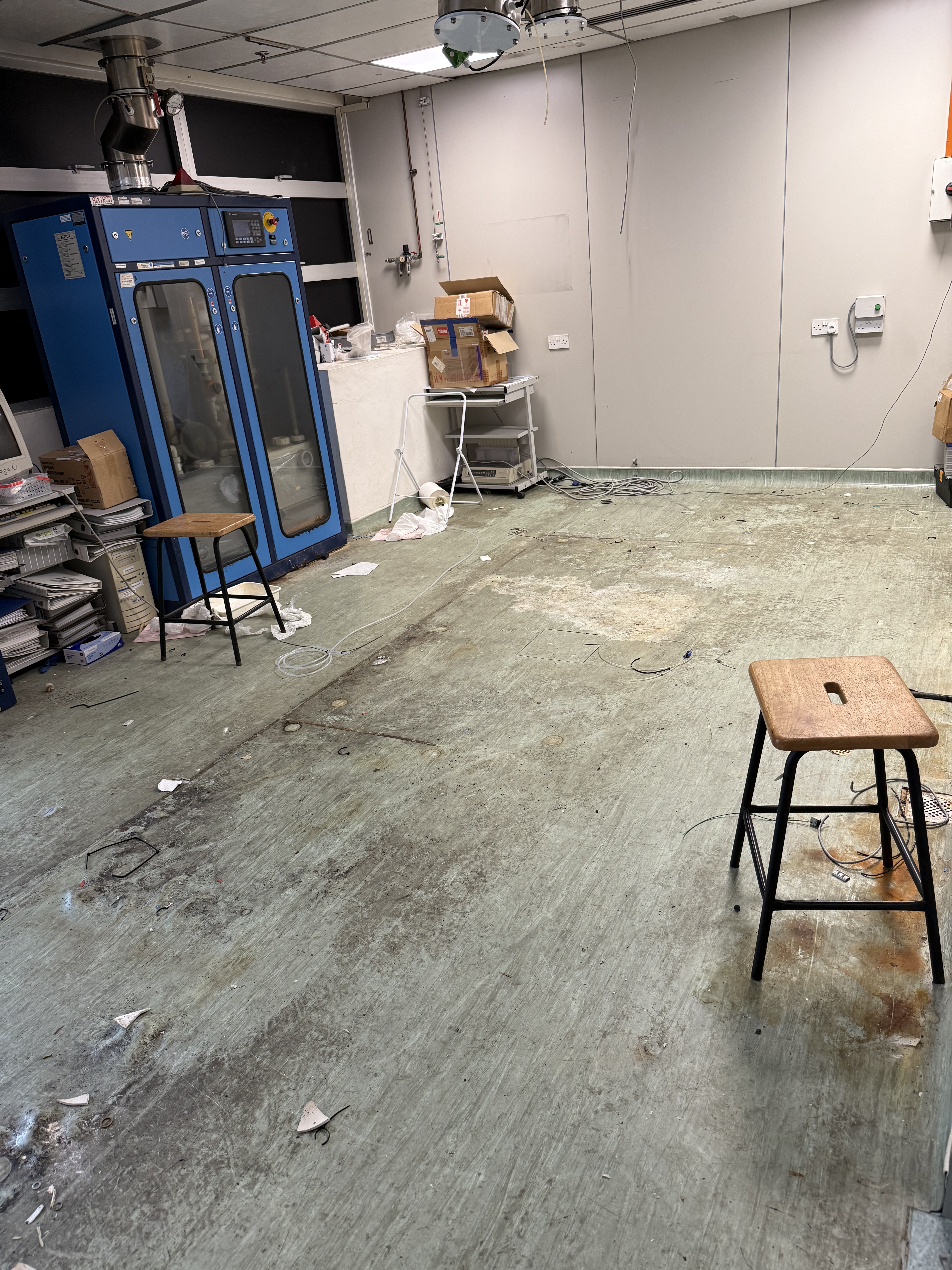 After: empty lab space, ready for the next tenant.
